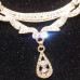 Goldtone Costume Necklace with Rhinestone Bar and Teardrop Pendant